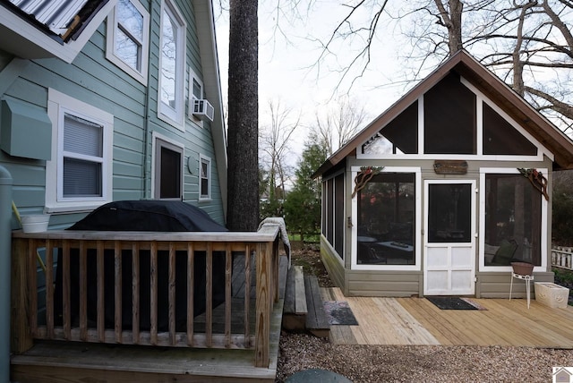 exterior space with cooling unit and a sunroom