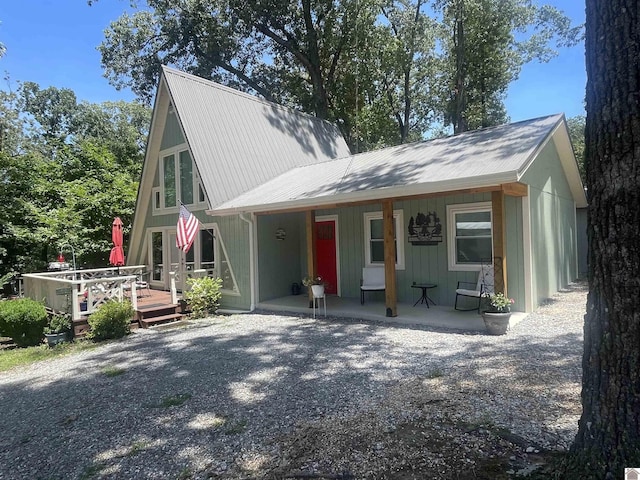 view of front of property featuring a wooden deck