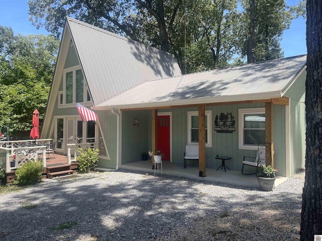 view of front of home featuring a wooden deck