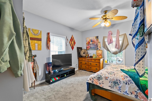 bedroom featuring ceiling fan and carpet flooring