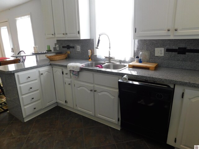 kitchen with dishwasher, sink, kitchen peninsula, and white cabinets