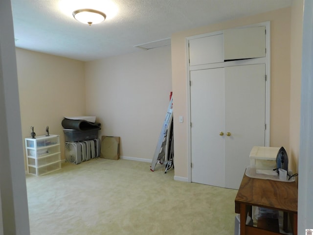 bedroom featuring light colored carpet