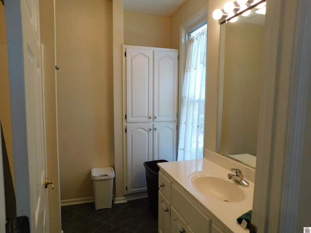 bathroom featuring tile patterned floors and vanity