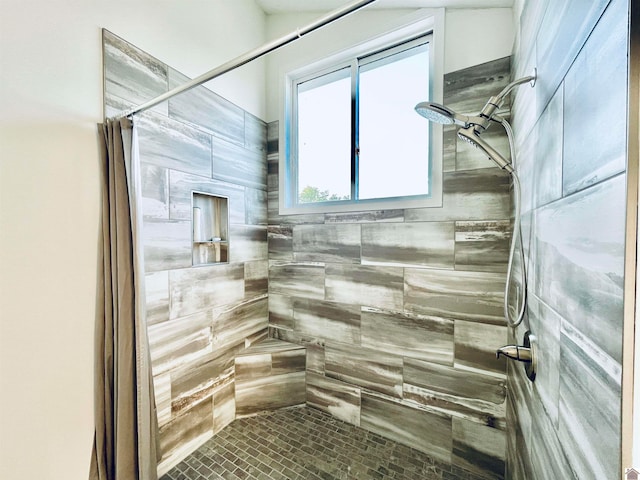 bathroom featuring walk in shower