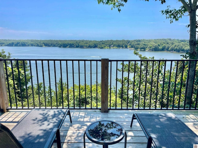 balcony featuring a water view