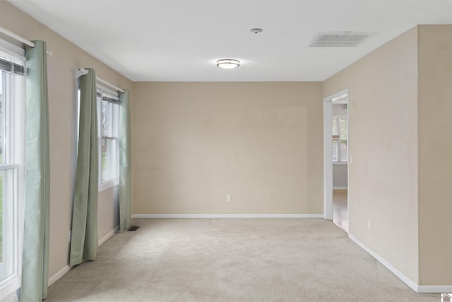 view of carpeted spare room