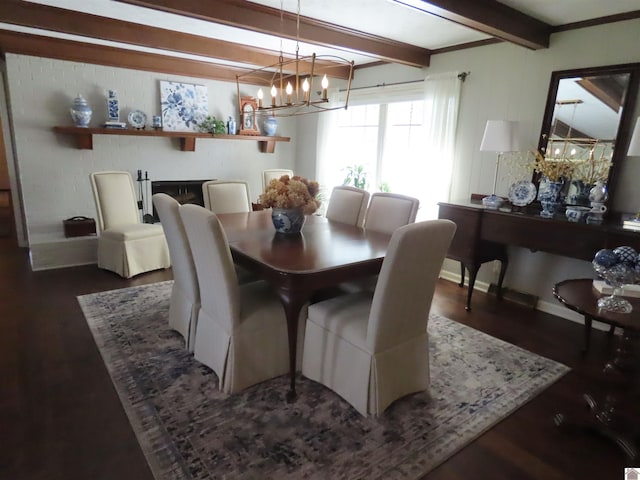 dining area with dark hardwood / wood-style flooring, beamed ceiling, and an inviting chandelier