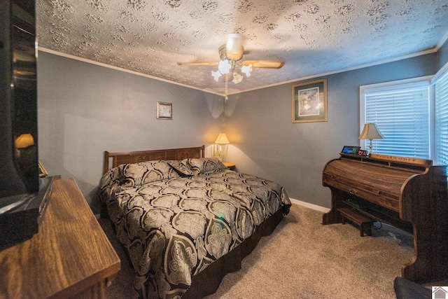 bedroom featuring a textured ceiling, carpet, and ceiling fan