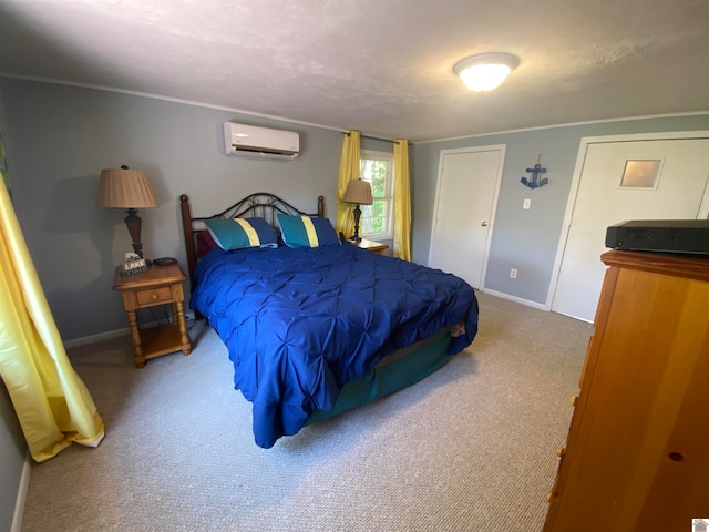 carpeted bedroom featuring a wall mounted air conditioner