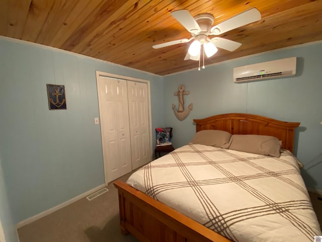 carpeted bedroom featuring a wall mounted AC, wood ceiling, ceiling fan, and a closet