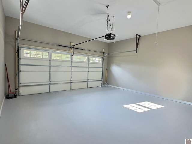 garage featuring a garage door opener