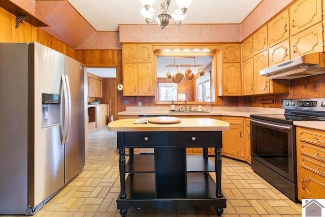 kitchen with appliances with stainless steel finishes, open shelves, a sink, a notable chandelier, and under cabinet range hood