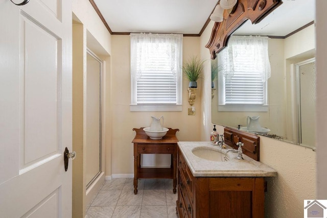 full bathroom with ornamental molding, a shower stall, a healthy amount of sunlight, and vanity
