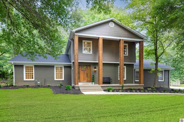 view of front of property featuring a porch and a front yard