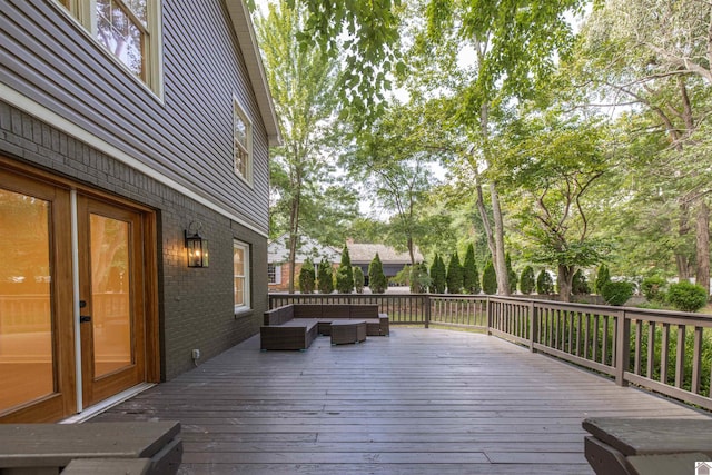 wooden deck featuring an outdoor hangout area