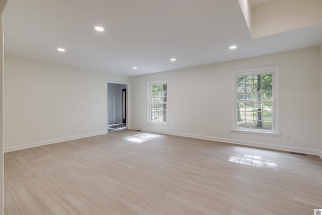 unfurnished room featuring light hardwood / wood-style flooring