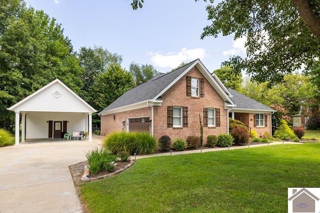 view of front of home with a carport, driveway, brick siding, and a front yard