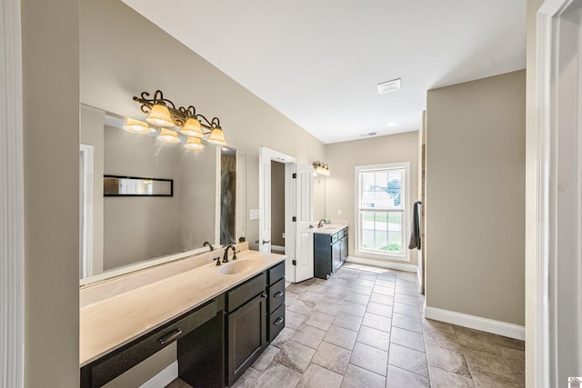 bathroom featuring tile patterned floors and vanity