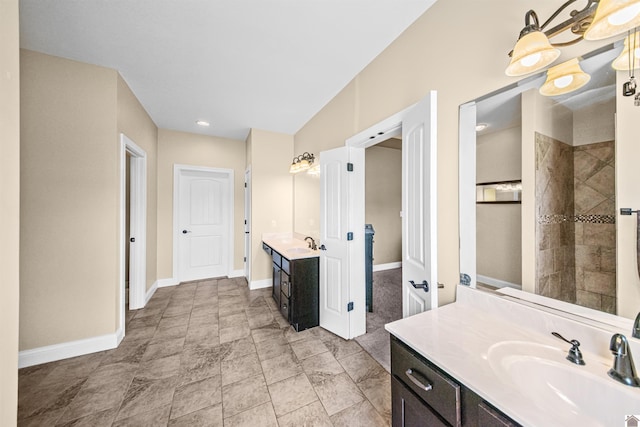 bathroom featuring tile patterned flooring and vanity