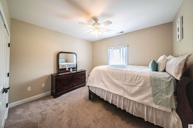 bedroom with ceiling fan and carpet