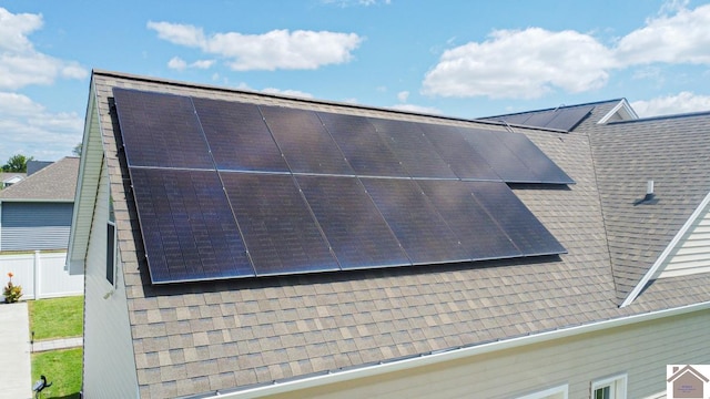 view of home's exterior featuring solar panels