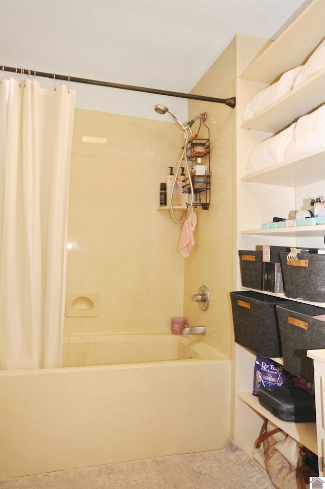 bathroom featuring vanity and shower / bath combo