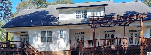 back of house with a pergola, ceiling fan, a deck, and french doors