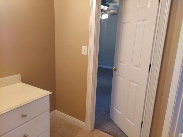 bathroom with vanity, ceiling fan, and tile patterned floors