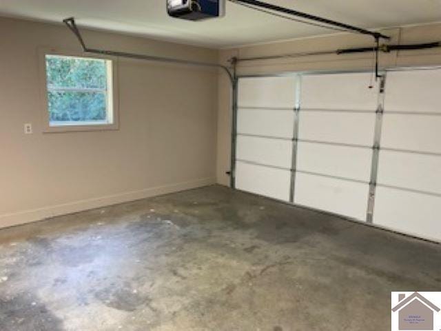 garage featuring a garage door opener