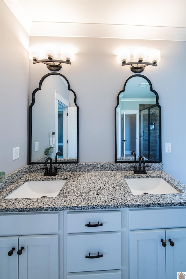 full bath featuring double vanity and a sink