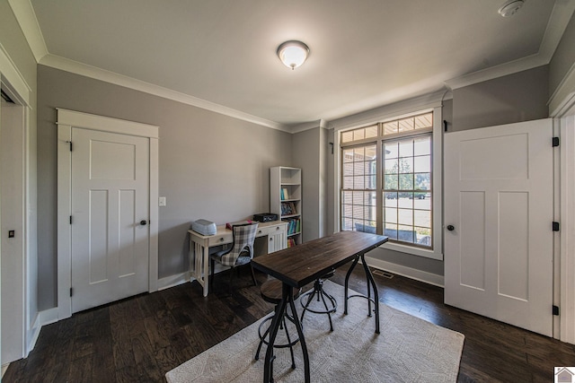 office area featuring ornamental molding, visible vents, baseboards, and dark wood-style floors