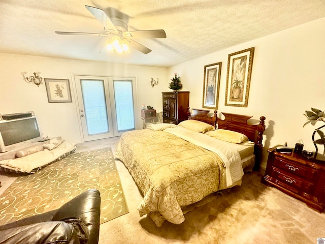 bedroom with a textured ceiling, access to exterior, carpet flooring, and ceiling fan