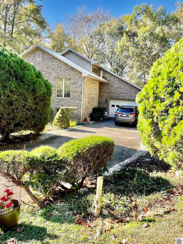 view of side of home with a garage