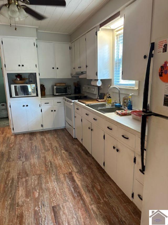 kitchen featuring white cabinets, white appliances, hardwood / wood-style flooring, and ceiling fan