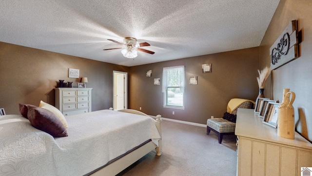 bedroom featuring a textured ceiling, ceiling fan, and carpet flooring