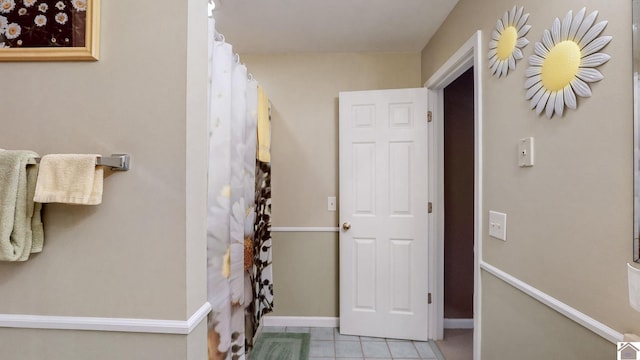 interior space featuring light tile patterned floors