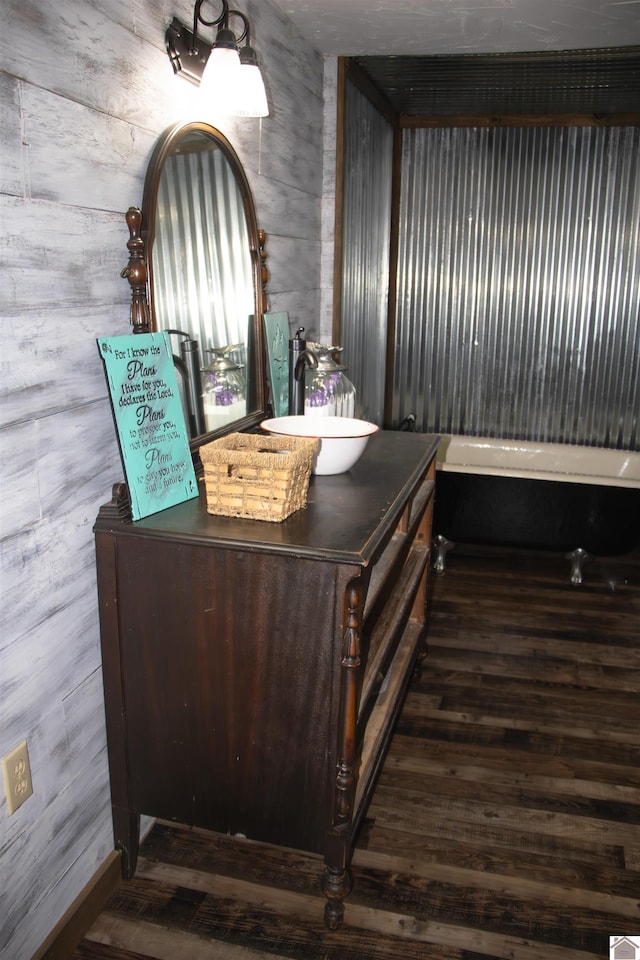 interior space featuring sink and dark hardwood / wood-style flooring