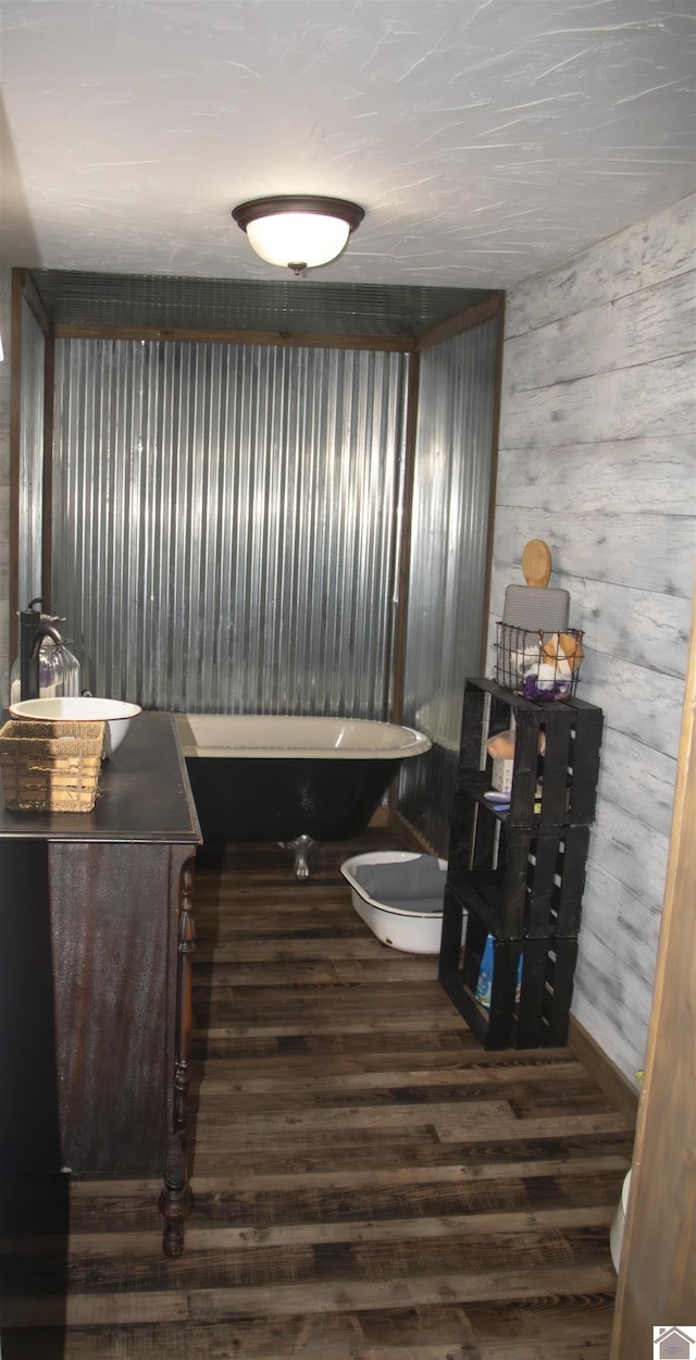 dining space featuring dark hardwood / wood-style floors and sink