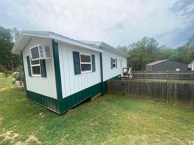 view of home's exterior featuring a lawn