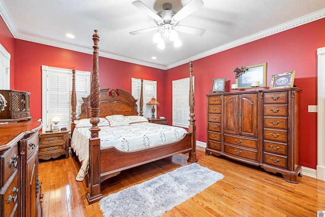 bedroom featuring ornamental molding, light hardwood / wood-style flooring, and ceiling fan