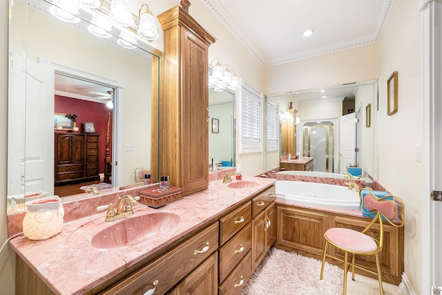 bathroom featuring shower with separate bathtub, ornamental molding, and vanity