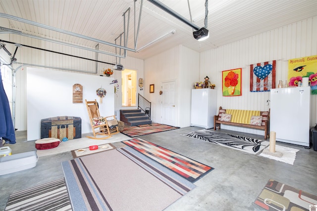 garage with white fridge