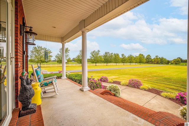 view of patio featuring a porch