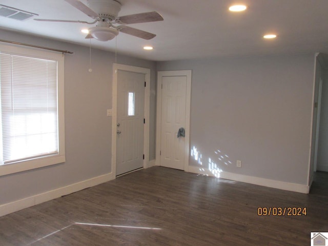 entryway featuring ceiling fan and dark hardwood / wood-style flooring