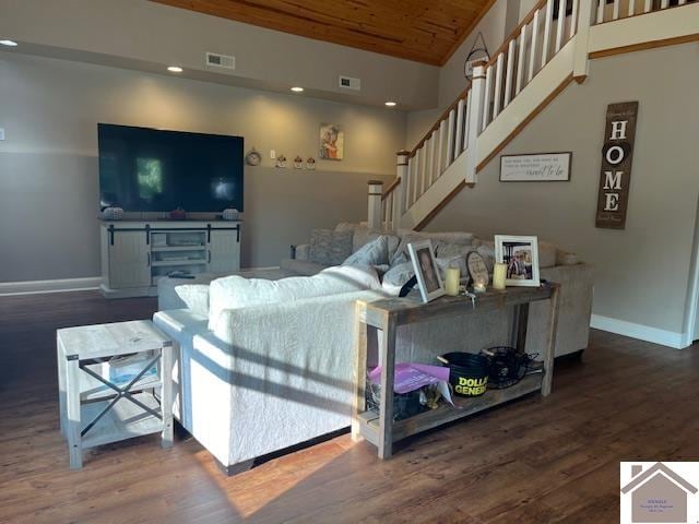 living room with wood ceiling and dark hardwood / wood-style floors