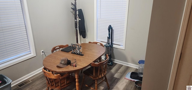 dining room featuring dark hardwood / wood-style floors