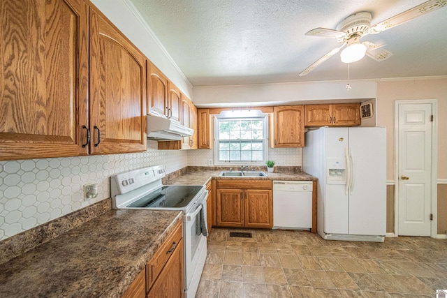 kitchen with white appliances, ceiling fan, decorative backsplash, and sink