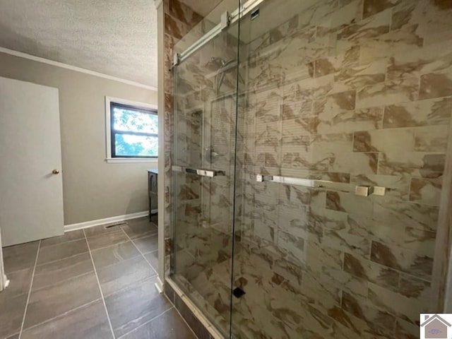 bathroom featuring walk in shower, crown molding, and a textured ceiling