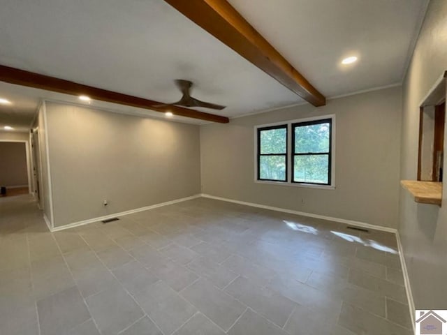 tiled empty room with ceiling fan and beamed ceiling