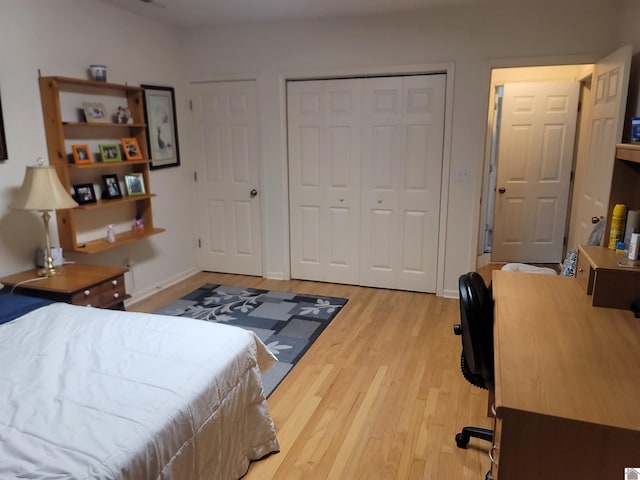 bedroom with light hardwood / wood-style floors